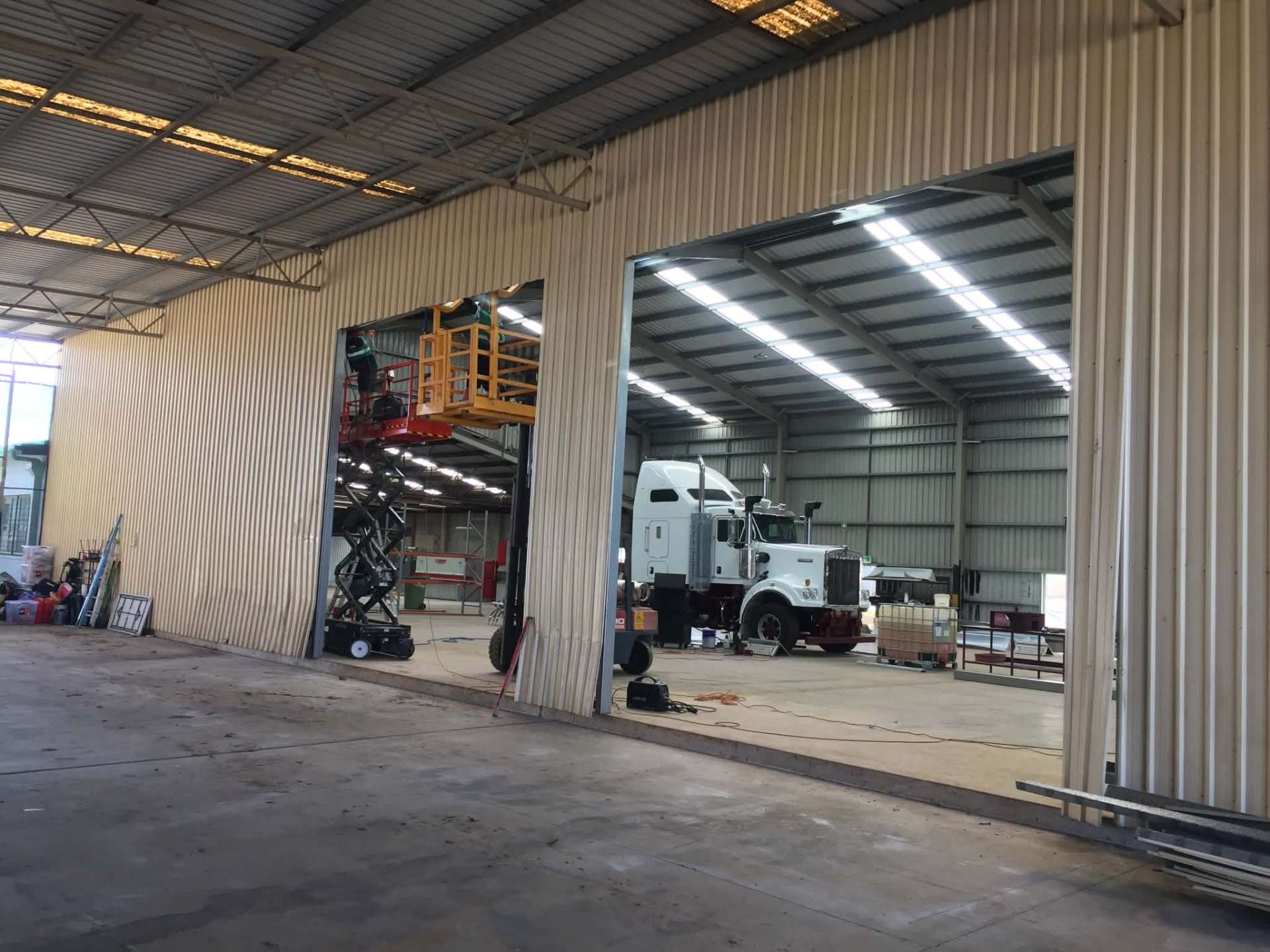 Industrial roller doors on a transport depot shed
